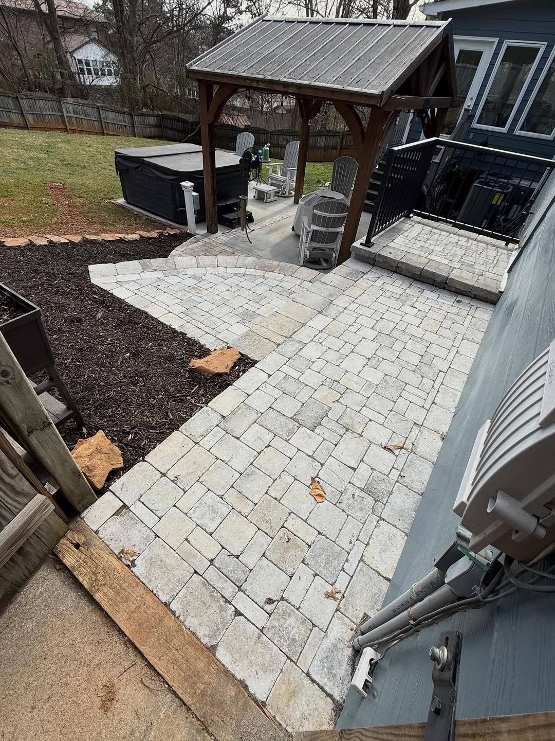 Paver patio with pergola and hot tub