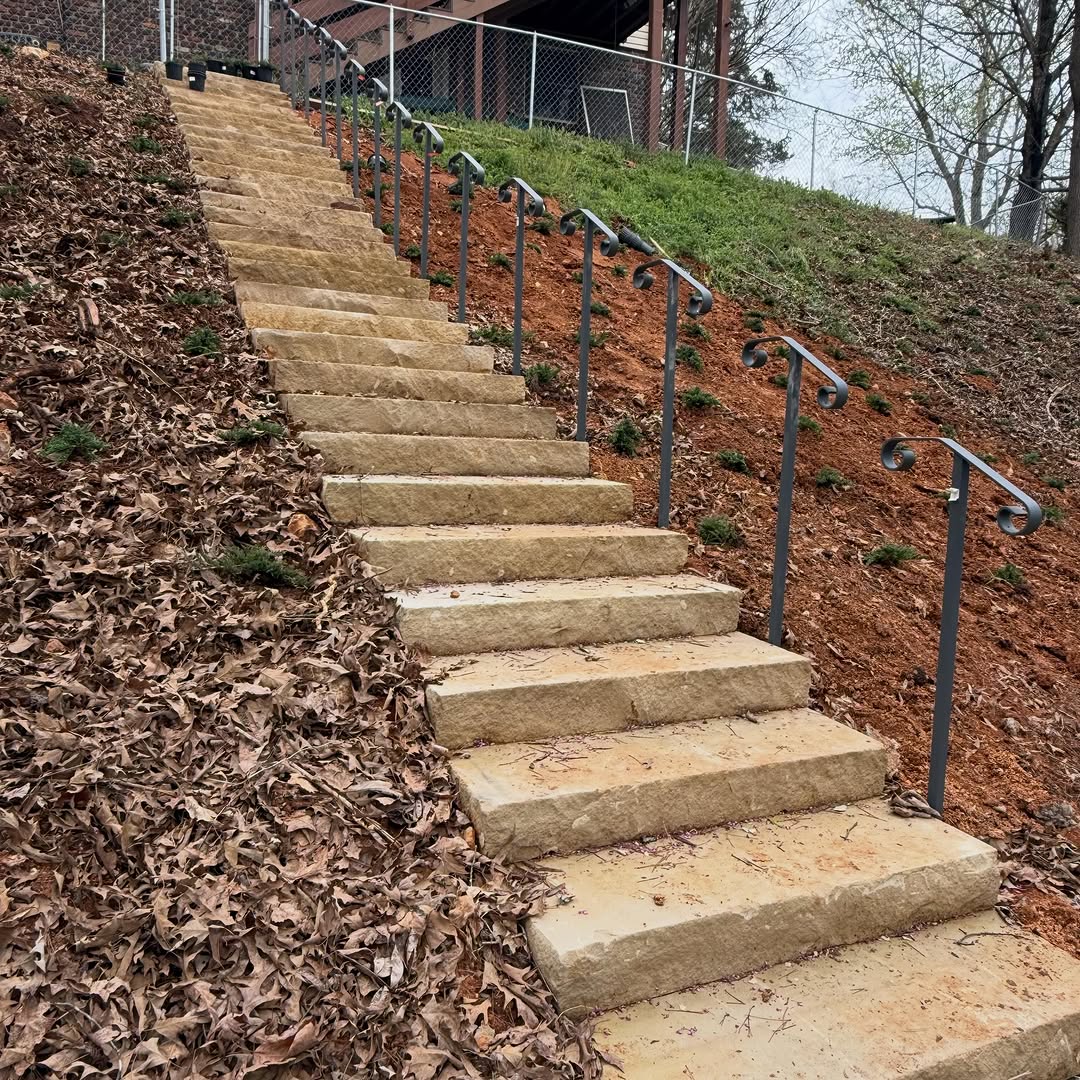 Stone treads with handrail and juniper